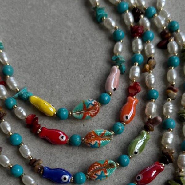 Colar pérola peixinhos